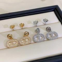 A pair of S925 silver pig nose pearl earrings set with white zircon(without pearl)