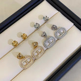 A pair of S925 silver pig nose pearl earrings set with white zircon(without pearl)