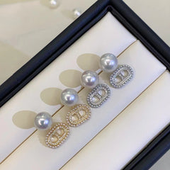 A pair of S925 silver pig nose pearl earrings set with white zircon(without pearl)